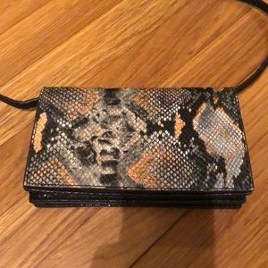 Punchcase leather crossbody